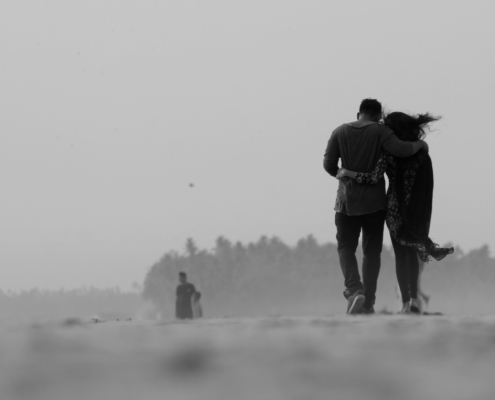 A grayscale photograph of a couple