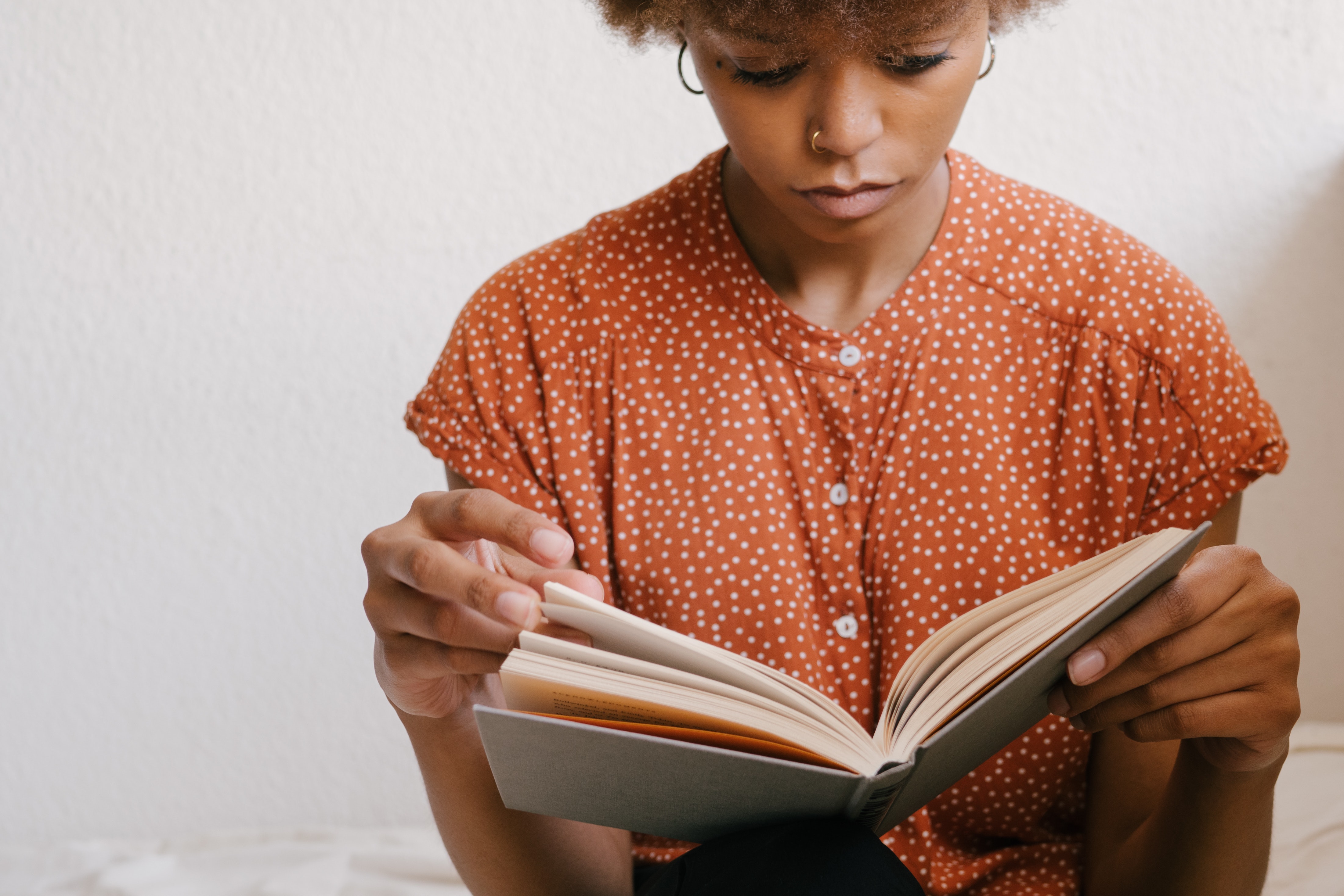 Photo of Woman Reading Book 